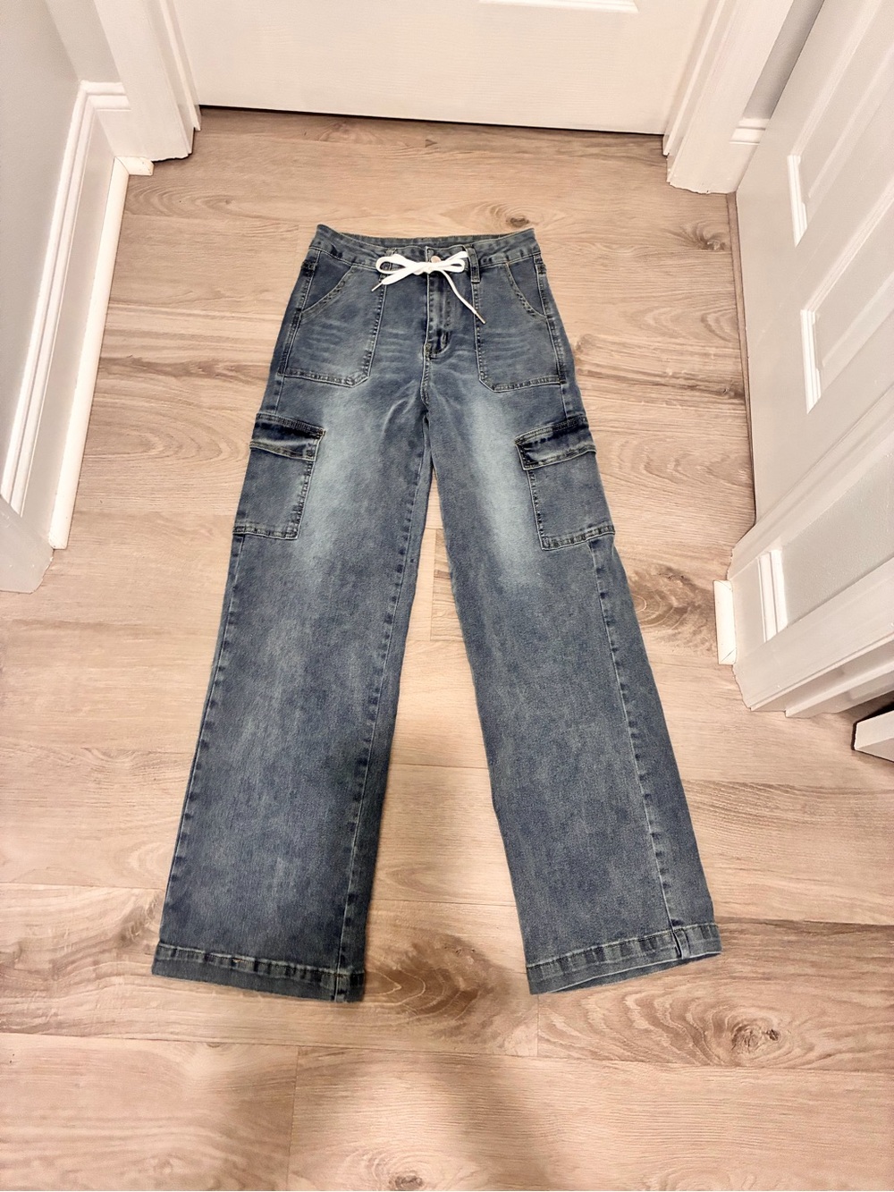 Denim jeans with front and side pockets.